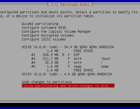 A screenshot of the Debian installer showing the configured storage partitions.